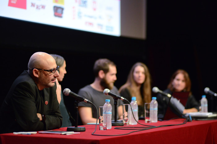Poka Yio, moderator of the second session and the artists in the panel.